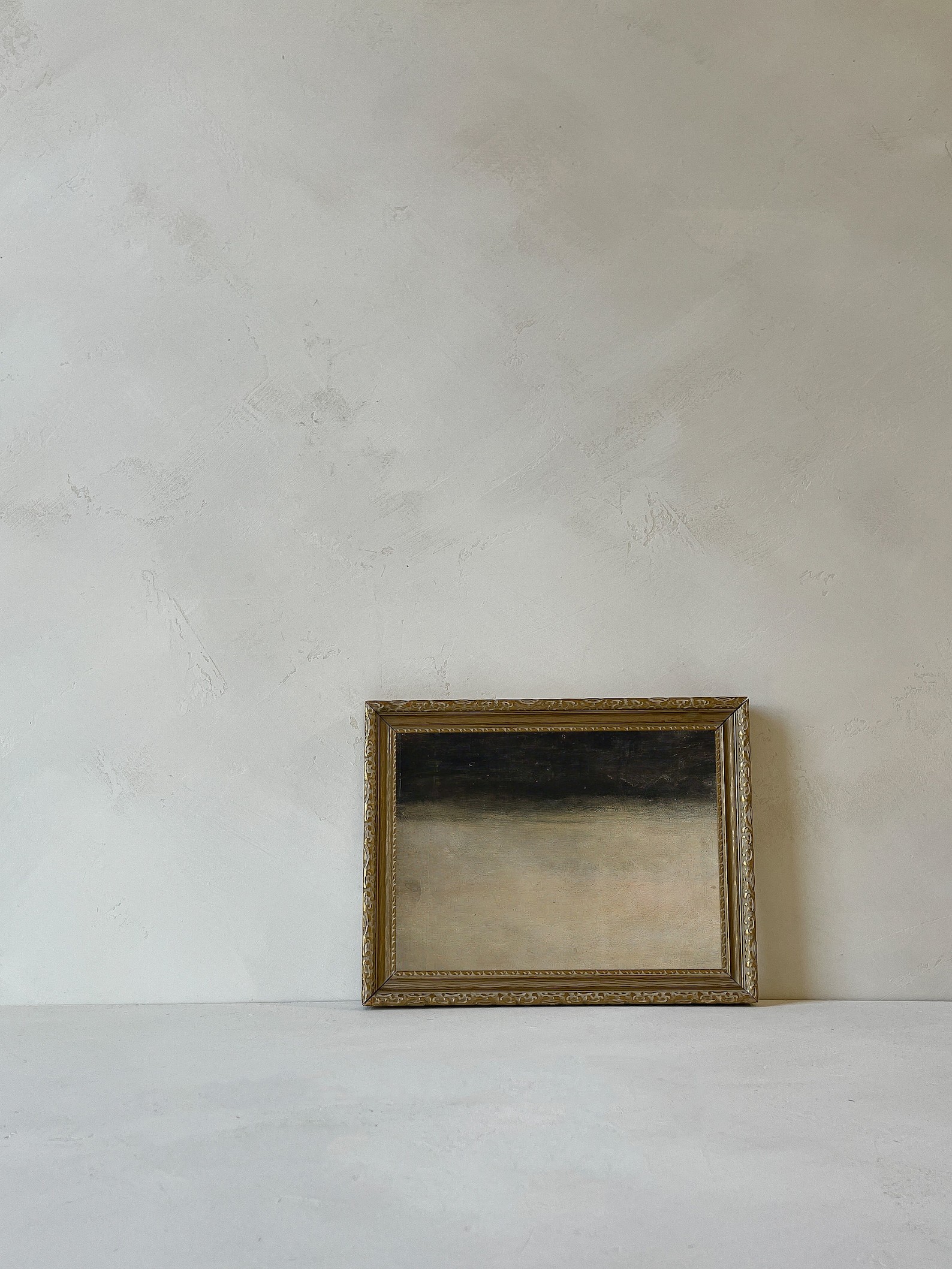 Abstract horizon painting in gold frame