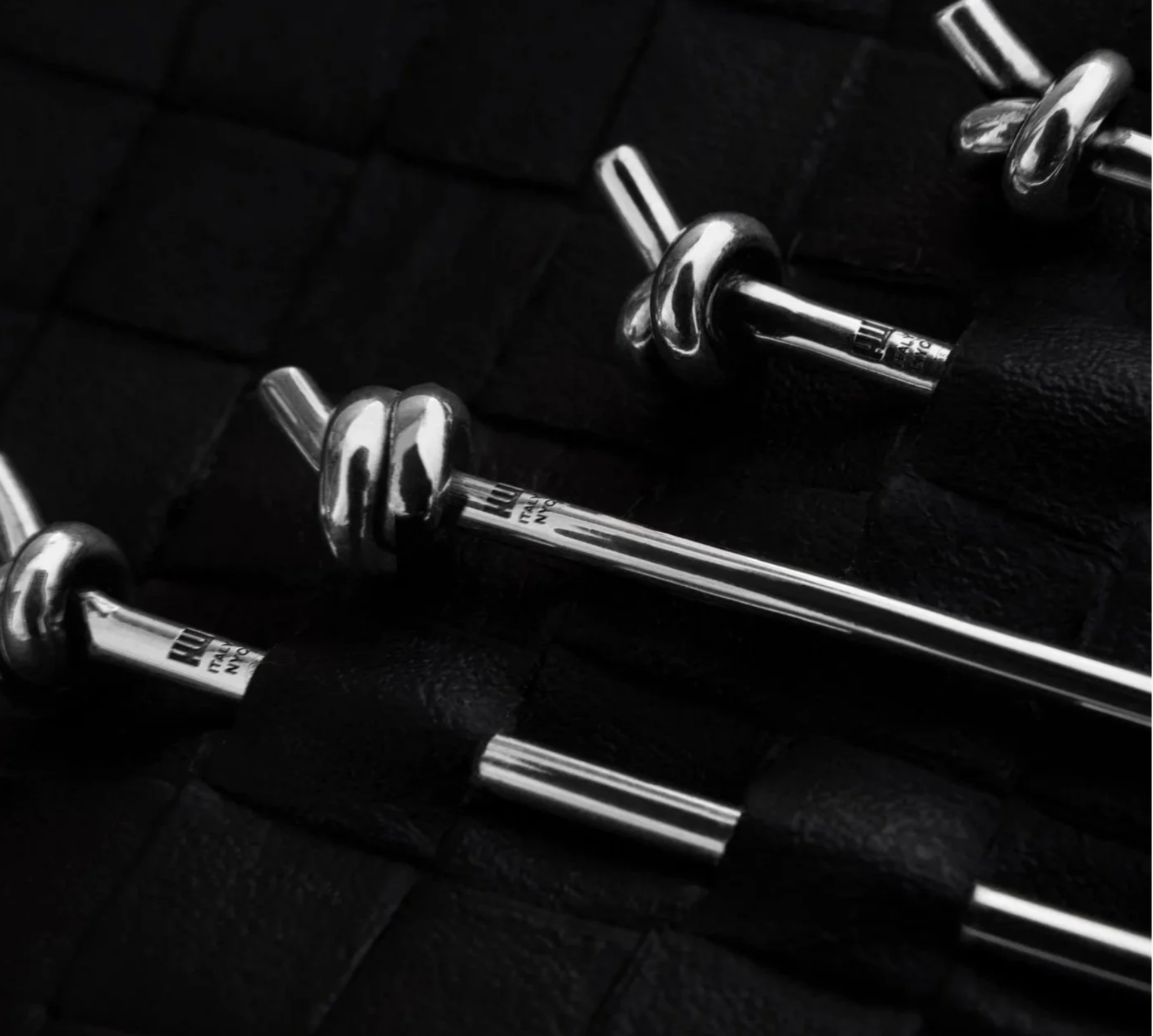 Silver cocktail picks with knot detail