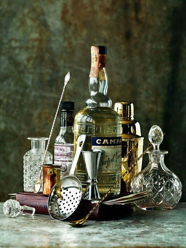 Vintage barware, Campari and crystal decanters still life